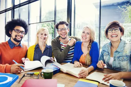 Team of educators working together at a table